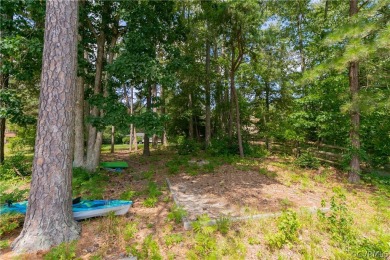 Nice one-story waterfront cottage.  Lake Caroline is on Pendleton Golf Club in Virginia - for sale on GolfHomes.com, golf home, golf lot