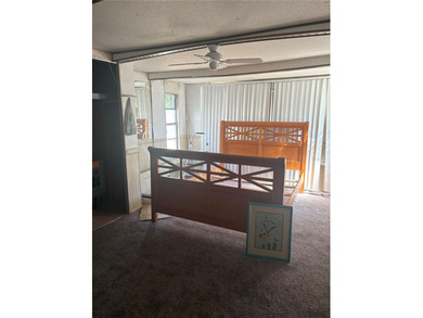 Welcome home to this 2-bedroom, 2-bath residence located in the on Betmar Acres Golf Club in Florida - for sale on GolfHomes.com, golf home, golf lot