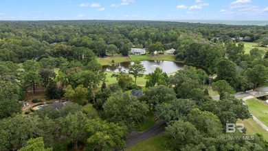 Nestled along the  14th Hole of the Azalea Golf course in the on Lakewood Golf Club in Alabama - for sale on GolfHomes.com, golf home, golf lot