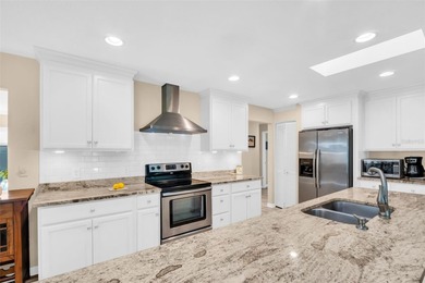 This beautifully updated and stunning home with nearly 1,900 on Highland Lakes Executive Golf Course in Florida - for sale on GolfHomes.com, golf home, golf lot