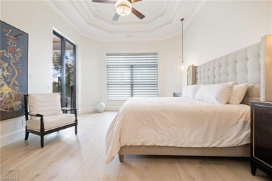 THIS HOME HAS IT ALL! New roof, flood barriers, hurricane impact on West Bay Beach and Golf Club in Florida - for sale on GolfHomes.com, golf home, golf lot