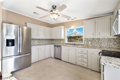 Enjoy Florida waterfront living - and move right in, as this on Pine Lakes Country Club in Florida - for sale on GolfHomes.com, golf home, golf lot