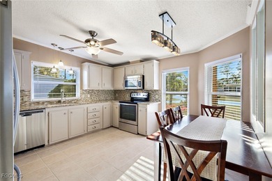 Enjoy Florida waterfront living - and move right in, as this on Pine Lakes Country Club in Florida - for sale on GolfHomes.com, golf home, golf lot