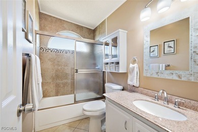 Enjoy Florida waterfront living - and move right in, as this on Pine Lakes Country Club in Florida - for sale on GolfHomes.com, golf home, golf lot