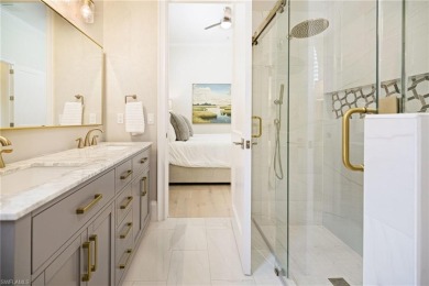 THIS HOME HAS IT ALL! New roof, flood barriers, hurricane impact on West Bay Beach and Golf Club in Florida - for sale on GolfHomes.com, golf home, golf lot