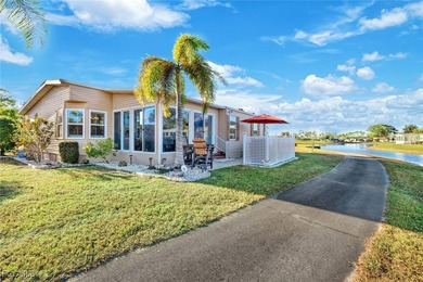 Enjoy Florida waterfront living - and move right in, as this on Pine Lakes Country Club in Florida - for sale on GolfHomes.com, golf home, golf lot