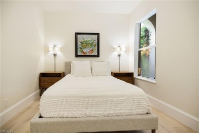 THIS HOME HAS IT ALL! New roof, flood barriers, hurricane impact on West Bay Beach and Golf Club in Florida - for sale on GolfHomes.com, golf home, golf lot