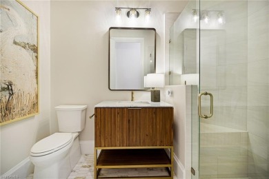 THIS HOME HAS IT ALL! New roof, flood barriers, hurricane impact on West Bay Beach and Golf Club in Florida - for sale on GolfHomes.com, golf home, golf lot