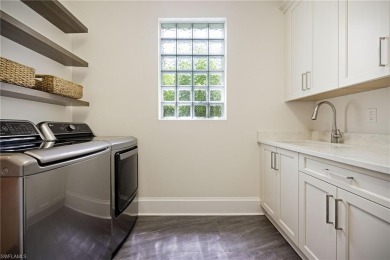 THIS HOME HAS IT ALL! New roof, flood barriers, hurricane impact on West Bay Beach and Golf Club in Florida - for sale on GolfHomes.com, golf home, golf lot