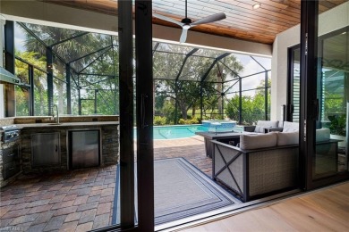 THIS HOME HAS IT ALL! New roof, flood barriers, hurricane impact on West Bay Beach and Golf Club in Florida - for sale on GolfHomes.com, golf home, golf lot