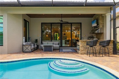 THIS HOME HAS IT ALL! New roof, flood barriers, hurricane impact on West Bay Beach and Golf Club in Florida - for sale on GolfHomes.com, golf home, golf lot