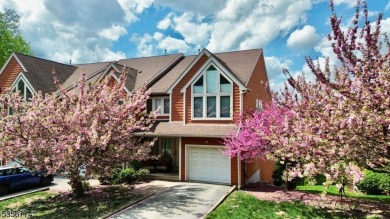 This 3-bedroom, 3-bath end-unit townhome isn't just a place to on Minerals Golf Club in New Jersey - for sale on GolfHomes.com, golf home, golf lot