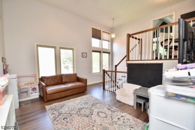 This 3-bedroom, 3-bath end-unit townhome isn't just a place to on Minerals Golf Club in New Jersey - for sale on GolfHomes.com, golf home, golf lot