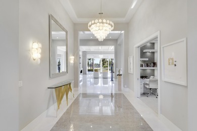 Spectacular 1-story residence by Mustapick Homes on a .39 acre on Old Palm Golf Club in Florida - for sale on GolfHomes.com, golf home, golf lot