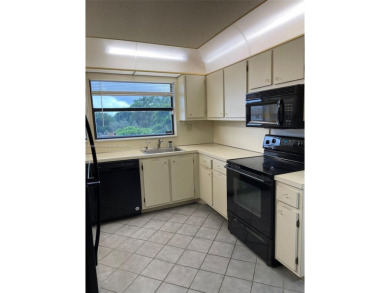 BEAUTIFULLY MAINTAINED 2 BED/2 BATH CONDO LOCATED IN THE SERENE on Sunrise Lakes Phase IV Golf Course in Florida - for sale on GolfHomes.com, golf home, golf lot