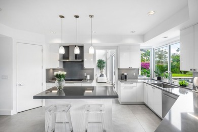 This meticulously maintained home, set on a rare, breathtaking on Boca West Golf and Country Club in Florida - for sale on GolfHomes.com, golf home, golf lot