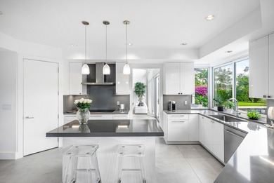 This meticulously maintained home, set on a rare, breathtaking on Woodfield Country Club in Florida - for sale on GolfHomes.com, golf home, golf lot