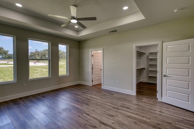 Impressive new construction in the sought-after Lighthouse on Packsaddle Country Club in Texas - for sale on GolfHomes.com, golf home, golf lot