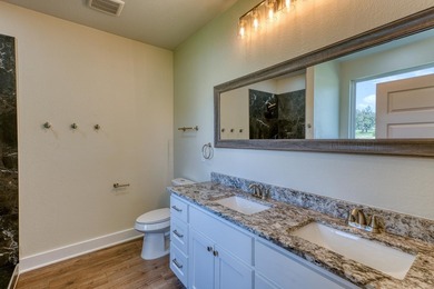 Impressive new construction in the sought-after Lighthouse on Packsaddle Country Club in Texas - for sale on GolfHomes.com, golf home, golf lot