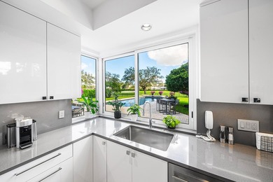 This meticulously maintained home, set on a rare, breathtaking on Boca West Golf and Country Club in Florida - for sale on GolfHomes.com, golf home, golf lot