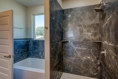 Impressive new construction in the sought-after Lighthouse on Packsaddle Country Club in Texas - for sale on GolfHomes.com, golf home, golf lot