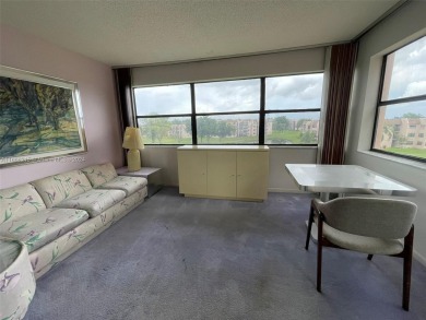 BEAUTIFULLY MAINTAINED 2 BED/2 BATH CONDO LOCATED IN THE SERENE on Sunrise Lakes Phase IV Golf Course in Florida - for sale on GolfHomes.com, golf home, golf lot