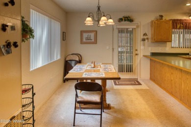 Tucked beneath towering pines in the heart of Pinetop Country on Pinetop Lakes Golf and Country Club in Arizona - for sale on GolfHomes.com, golf home, golf lot