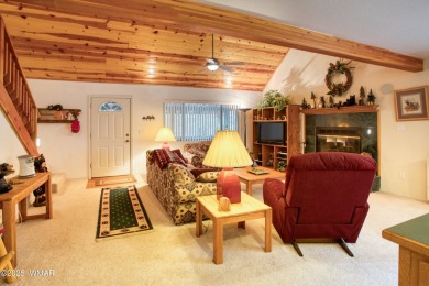 Tucked beneath towering pines in the heart of Pinetop Country on Pinetop Lakes Golf and Country Club in Arizona - for sale on GolfHomes.com, golf home, golf lot