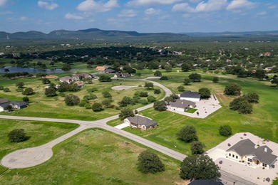 Impressive new construction in the sought-after Lighthouse on Packsaddle Country Club in Texas - for sale on GolfHomes.com, golf home, golf lot