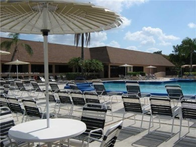 BEAUTIFULLY MAINTAINED 2 BED/2 BATH CONDO LOCATED IN THE SERENE on Sunrise Lakes Phase IV Golf Course in Florida - for sale on GolfHomes.com, golf home, golf lot