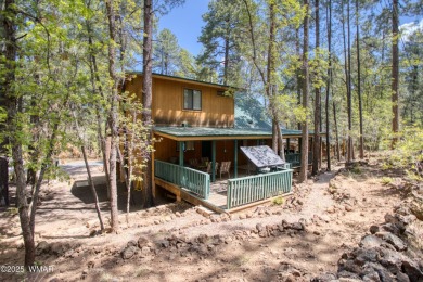 Tucked beneath towering pines in the heart of Pinetop Country on Pinetop Lakes Golf and Country Club in Arizona - for sale on GolfHomes.com, golf home, golf lot