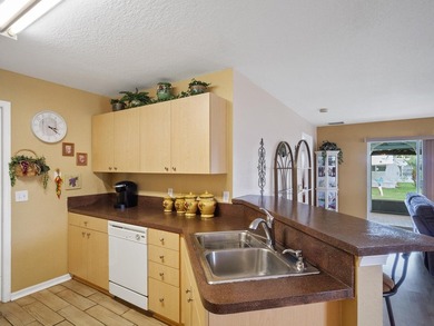 Welcome to this beautifully maintained CBS home located in a on Spanish Lakes Golf Village in Florida - for sale on GolfHomes.com, golf home, golf lot