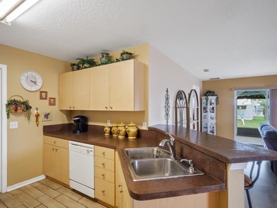 Welcome to this beautifully maintained CBS home located in a on Spanish Lakes Golf Village in Florida - for sale on GolfHomes.com, golf home, golf lot