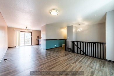 Welcome home to this beautiful 4-bedroom, 2-bath property on Indianhead Golf Club in Nebraska - for sale on GolfHomes.com, golf home, golf lot