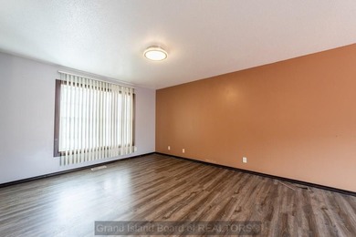 Welcome home to this beautiful 4-bedroom, 2-bath property on Indianhead Golf Club in Nebraska - for sale on GolfHomes.com, golf home, golf lot