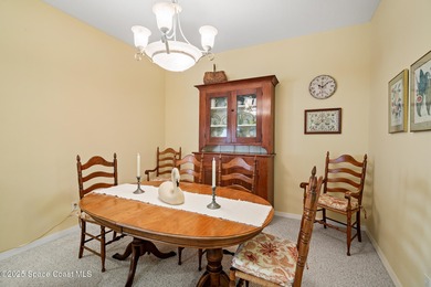 Charming villa in the desirable Viera East Golf Course community on Viera East Golf Club in Florida - for sale on GolfHomes.com, golf home, golf lot