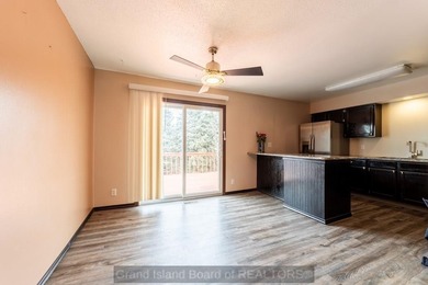 Welcome home to this beautiful 4-bedroom, 2-bath property on Indianhead Golf Club in Nebraska - for sale on GolfHomes.com, golf home, golf lot