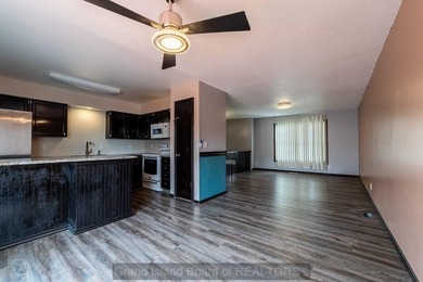 Welcome home to this beautiful 4-bedroom, 2-bath property on Indianhead Golf Club in Nebraska - for sale on GolfHomes.com, golf home, golf lot