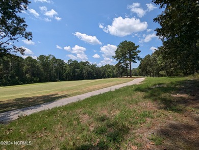 Nicely wooded, golf front lot on hole #9 in Woodlake Community on Woodlake Country Club in North Carolina - for sale on GolfHomes.com, golf home, golf lot