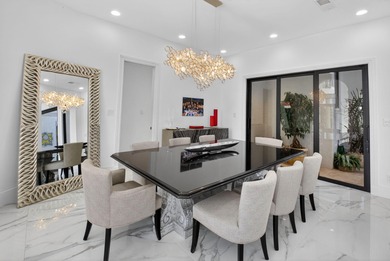 Renovated luxury estate home in St. Andrews Country Club, with on St. Andrews Country Club of Boca Raton in Florida - for sale on GolfHomes.com, golf home, golf lot