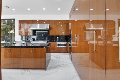 Renovated luxury estate home in St. Andrews Country Club, with on St. Andrews Country Club of Boca Raton in Florida - for sale on GolfHomes.com, golf home, golf lot