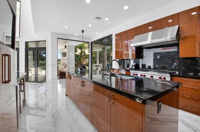Renovated luxury estate home in St. Andrews Country Club, with on St. Andrews Country Club of Boca Raton in Florida - for sale on GolfHomes.com, golf home, golf lot