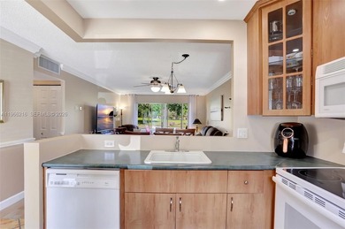 Beautiful and fully furnished 2-bedroom unit on the first floor on Lauderhill Golf Course in Florida - for sale on GolfHomes.com, golf home, golf lot