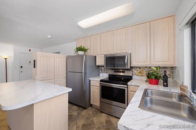 Discover this beautiful Top-Floor End Unit in the heart of San on Mission Trails Golf Course in California - for sale on GolfHomes.com, golf home, golf lot