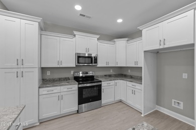 This NEW CONSTRUCTION, single level CRAFTSMAN style home is on Oyster Bay Golf Links in North Carolina - for sale on GolfHomes.com, golf home, golf lot