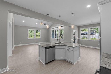 This NEW CONSTRUCTION, single level CRAFTSMAN style home is on Oyster Bay Golf Links in North Carolina - for sale on GolfHomes.com, golf home, golf lot