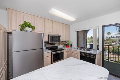 Discover this beautiful Top-Floor End Unit in the heart of San on Mission Trails Golf Course in California - for sale on GolfHomes.com, golf home, golf lot