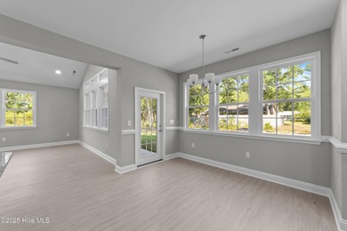 This NEW CONSTRUCTION, single level CRAFTSMAN style home is on Oyster Bay Golf Links in North Carolina - for sale on GolfHomes.com, golf home, golf lot