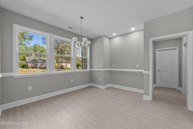 This NEW CONSTRUCTION, single level CRAFTSMAN style home is on Oyster Bay Golf Links in North Carolina - for sale on GolfHomes.com, golf home, golf lot