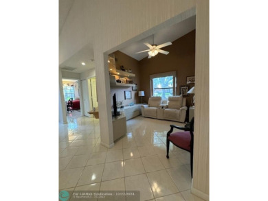 ****  BEAUTIFUL SPACIOUS VILLA OVERLOOKING THE LAKE IN on Gleneagles Golf and Country Club in Florida - for sale on GolfHomes.com, golf home, golf lot